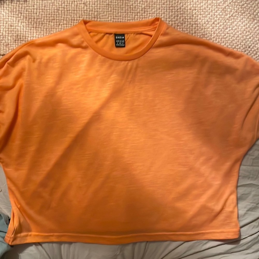 Flowy crop tops, neon orange